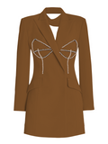 Brown blazer dress with a decorative bow on a white background