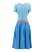 Model wearing a Maison Aria Dress