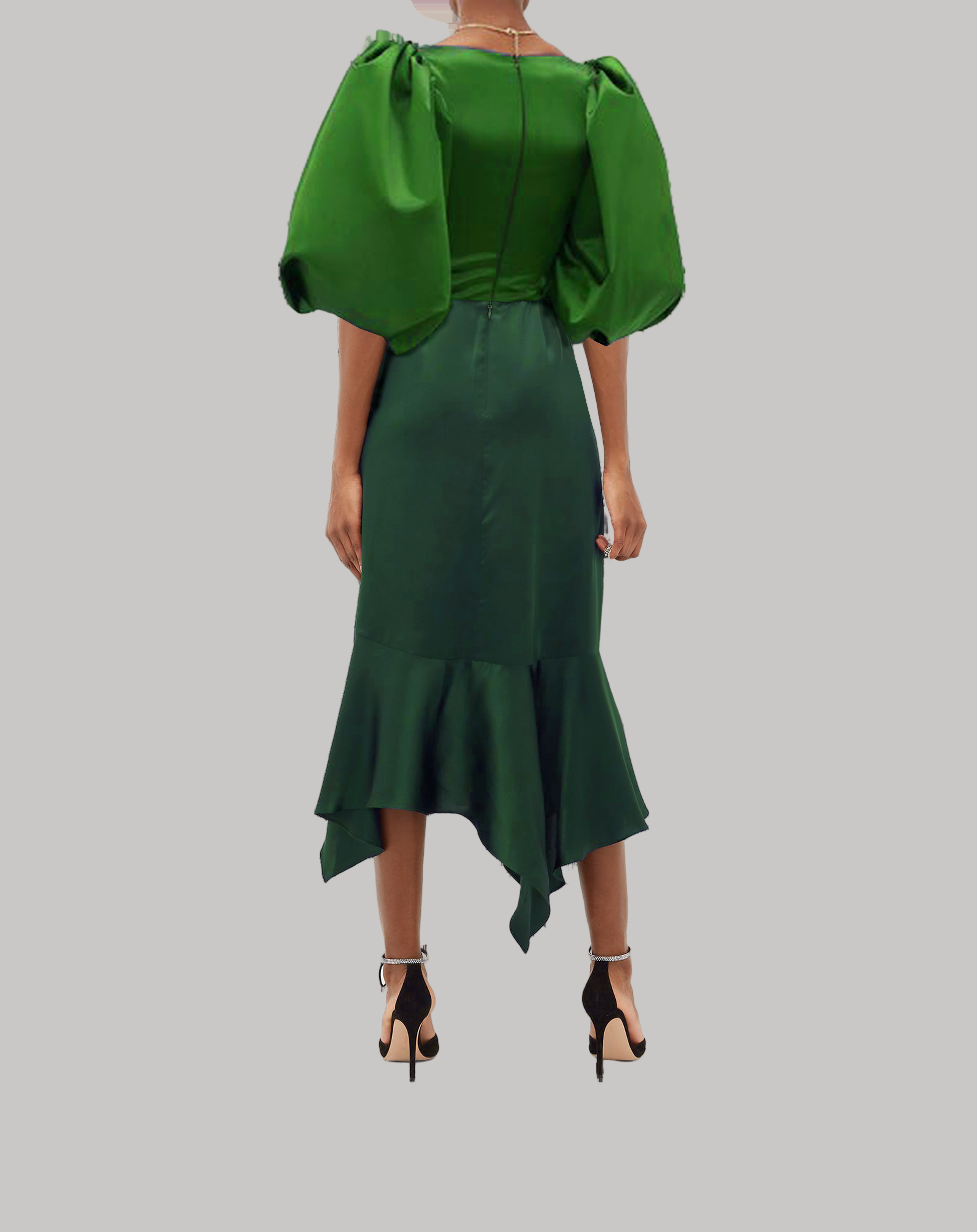 Green dress with puff sleeves on a white background