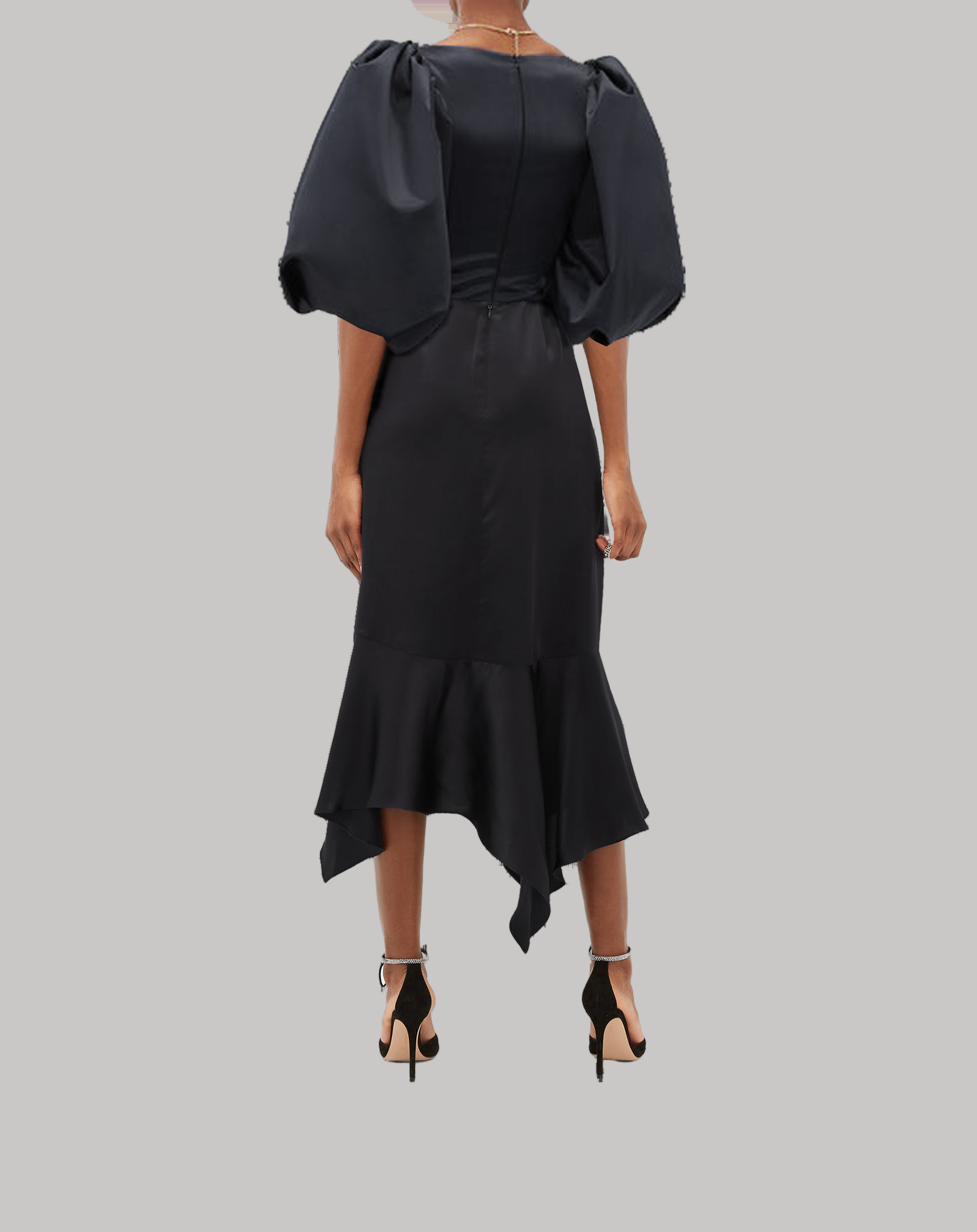 Black dress with puff sleeves on a white background
