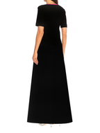 Black dress worn by a person on a white background