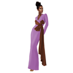 Woman wearing a long purple dress with a brown belt on a white background