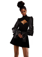 Model wearing a Maison Aria Dress