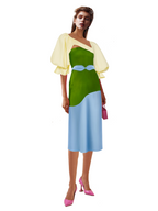 Woman wearing a green and blue dress with a yellow top on a white background