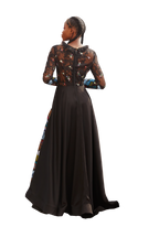 Model wearing a Maison Aria Dress