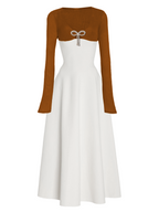 Model wearing a Maison Aria Dress