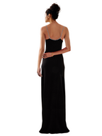 Model wearing a Maison Aria Dress