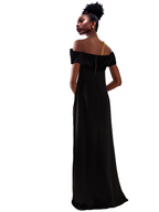 Model wearing a Maison Aria Dress