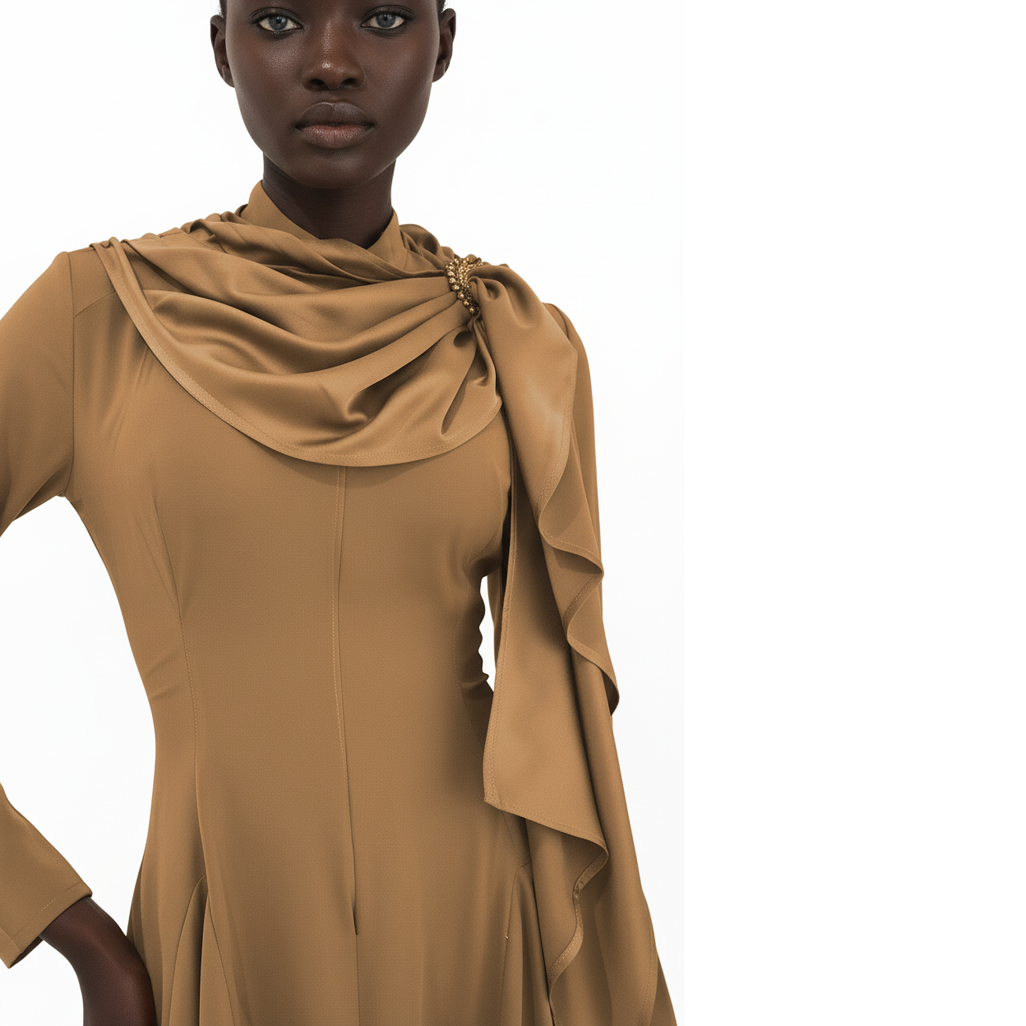 Woman wearing a brown dress with a draped design on a white background