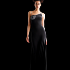 Woman wearing a black evening gown with a white pattern on a black background