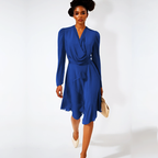Woman wearing a blue dress on a white background