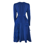 Blue dress with long sleeves on a white background