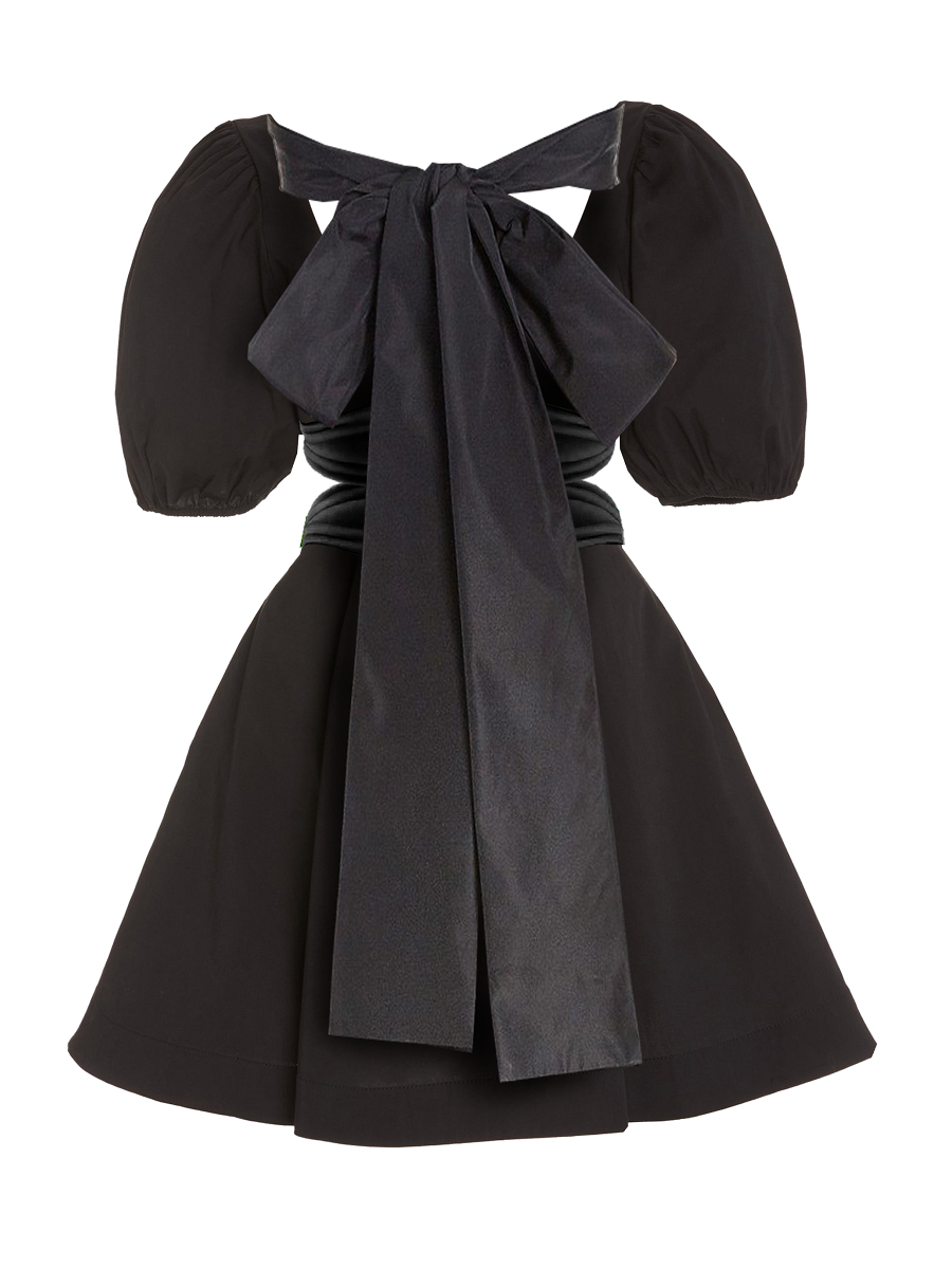 Model wearing a Maison Aria Dress