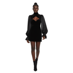 Black dress with long sleeves and cutout design on a white background