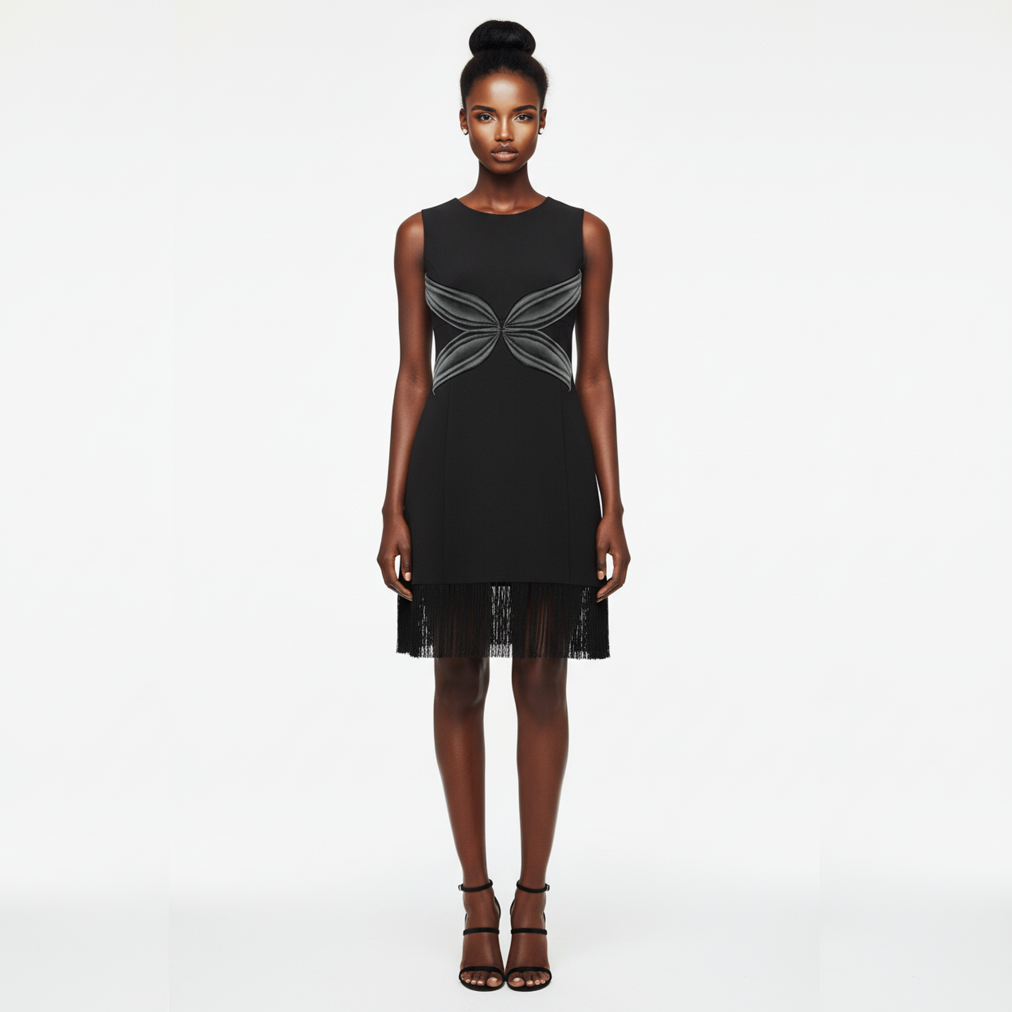 Black dress with geometric patterns on a white background