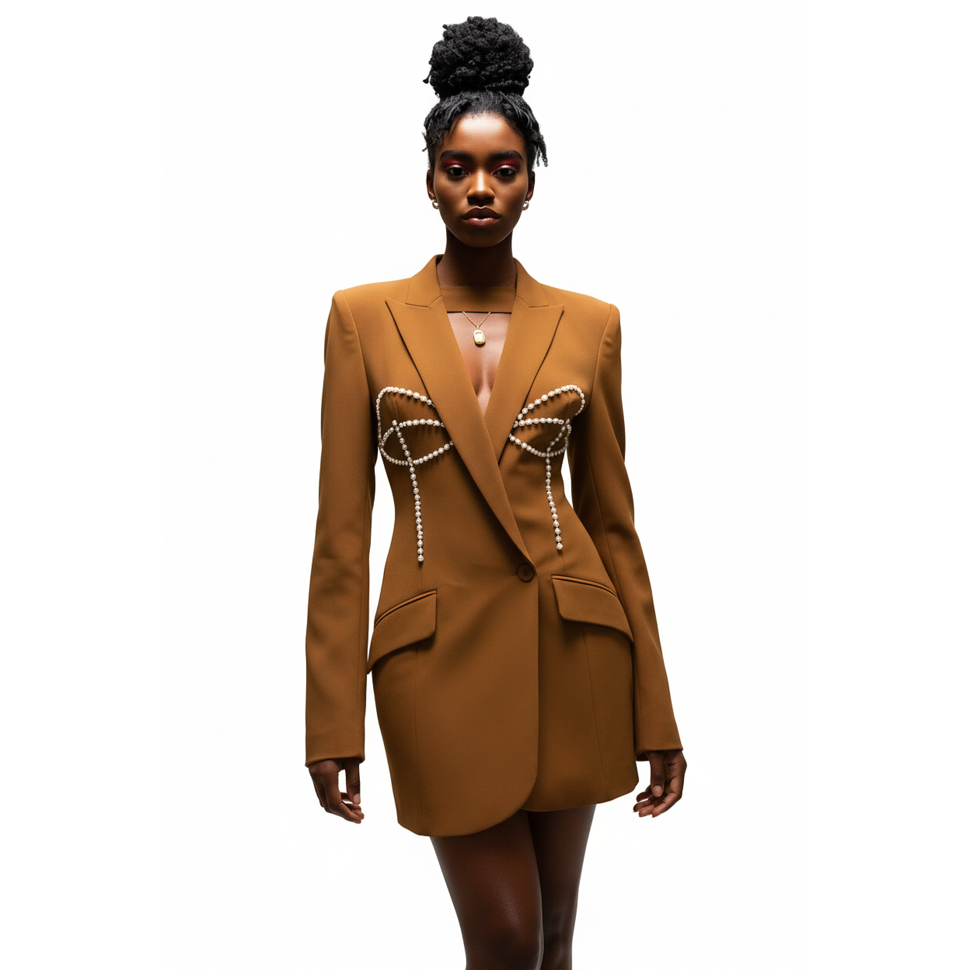 Woman wearing a brown blazer with pearl details on a white background
