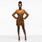 Woman wearing a brown suit with a white background