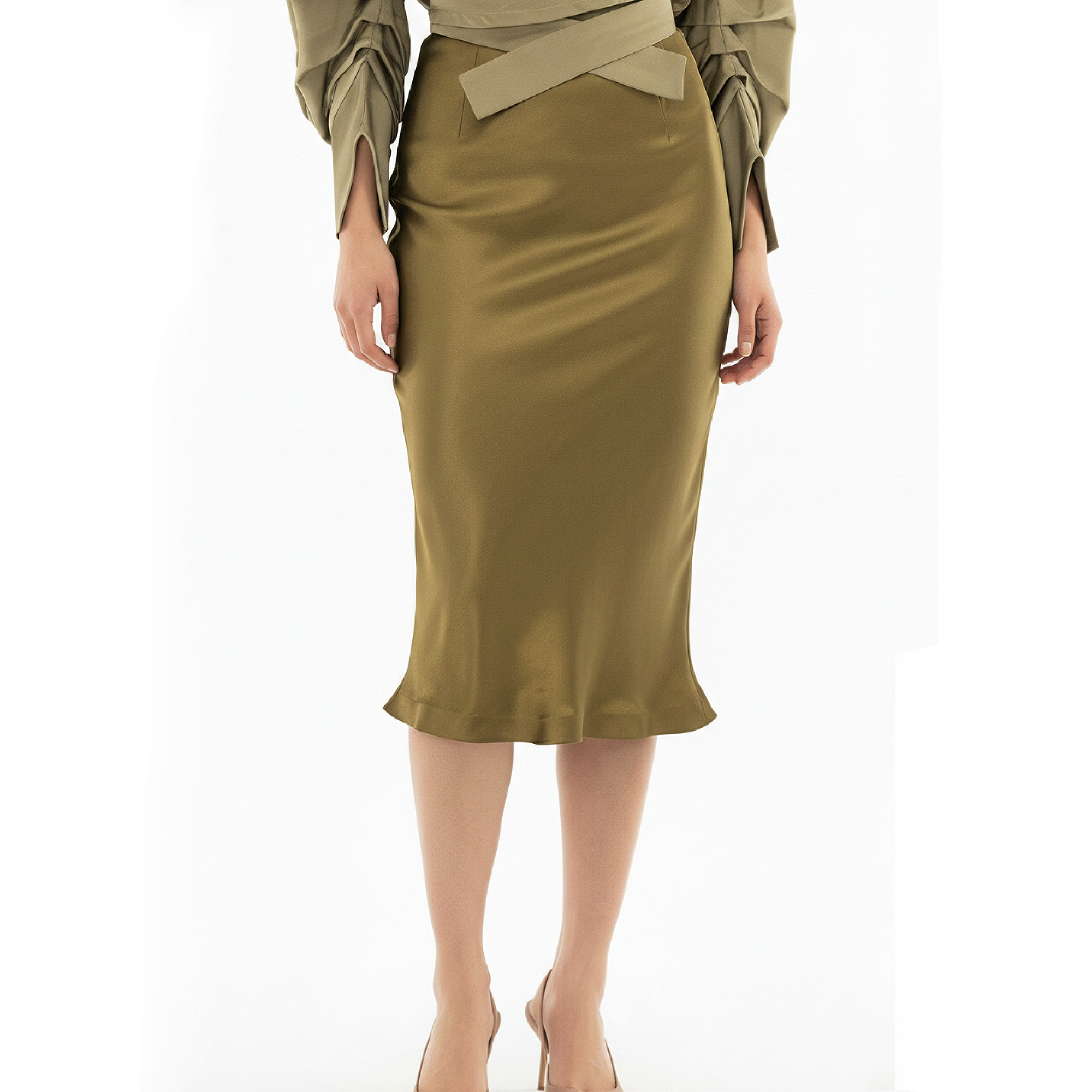 Green satin skirt worn with a matching top on a white background