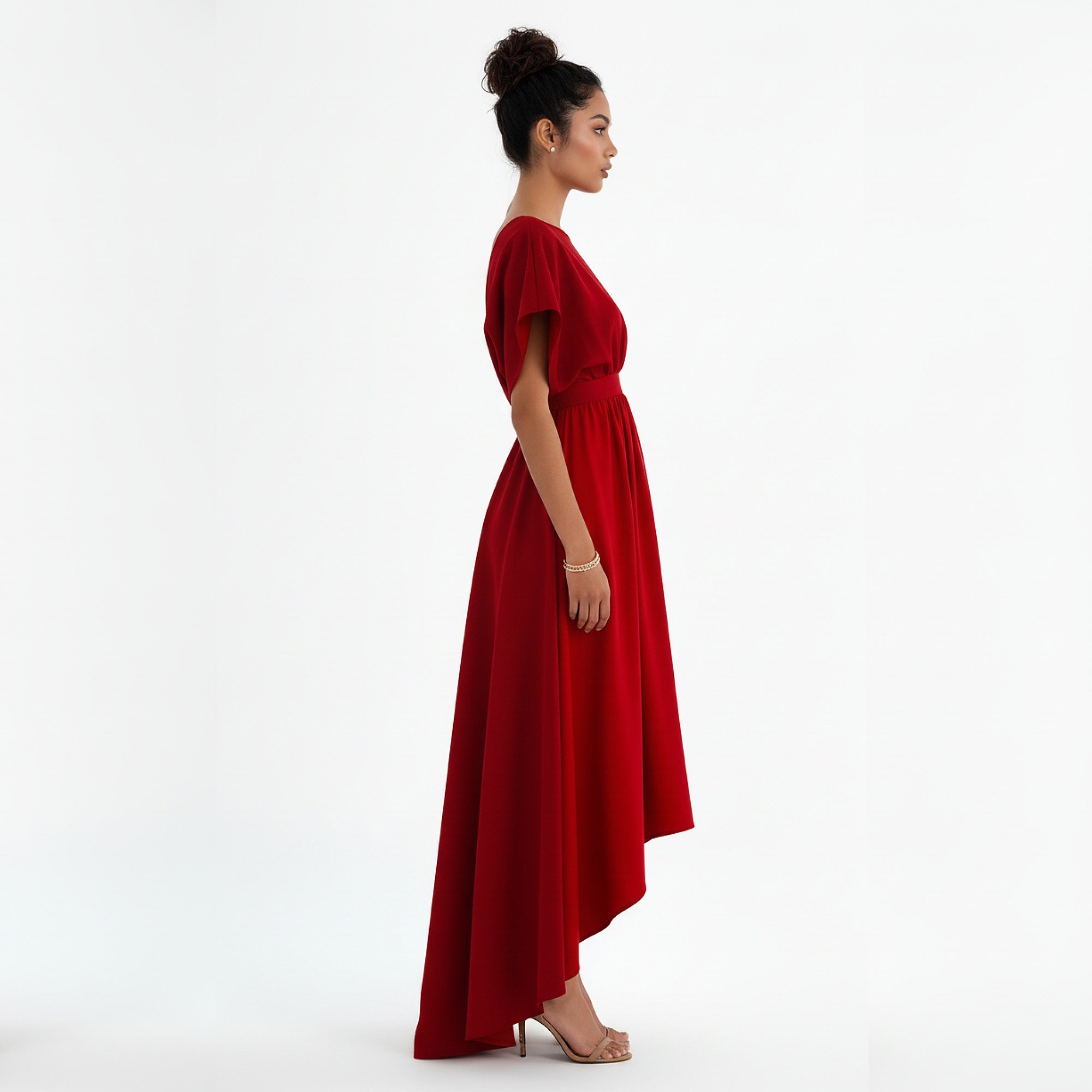 Woman wearing a red dress on a white background