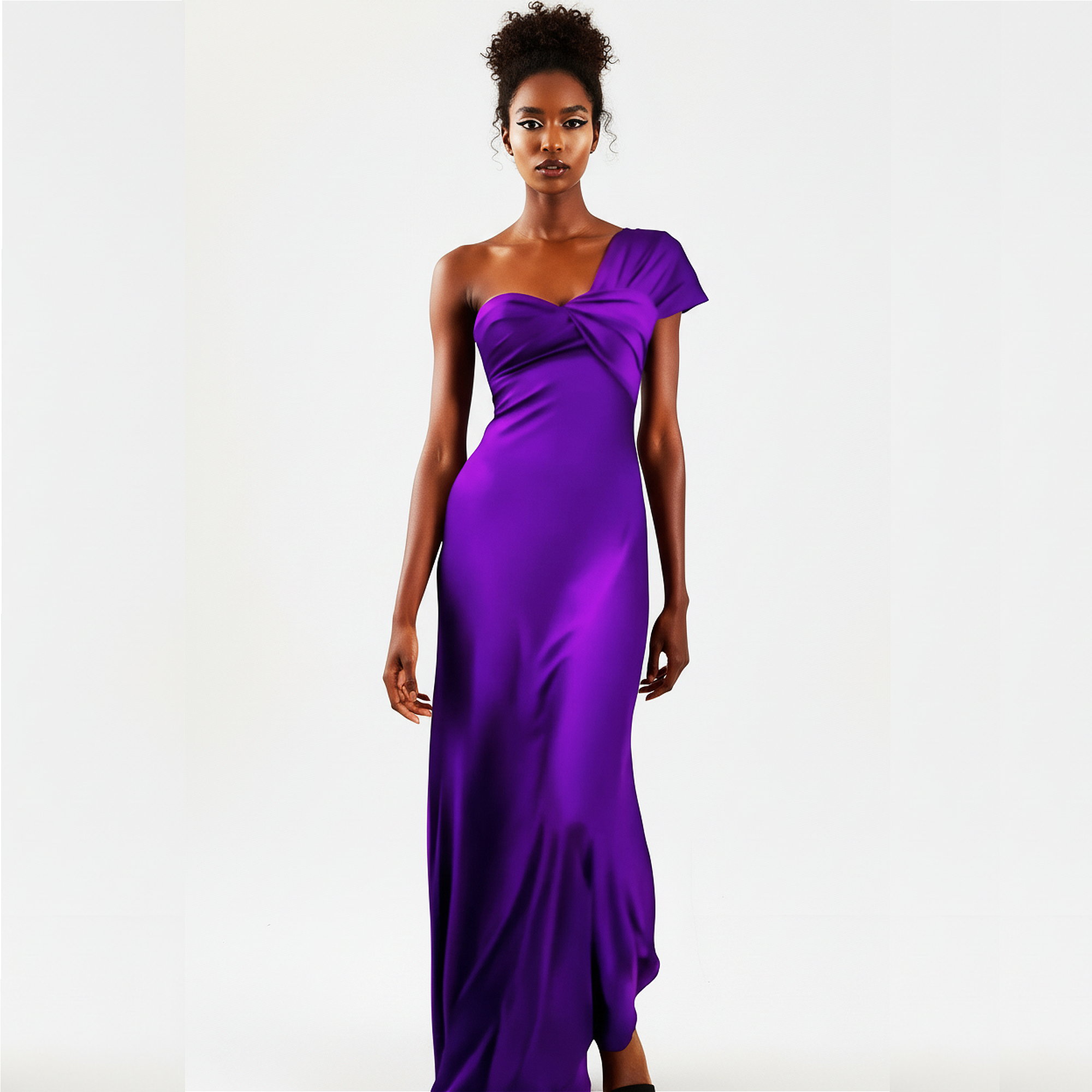 Woman wearing a purple one-shoulder gown on a white background