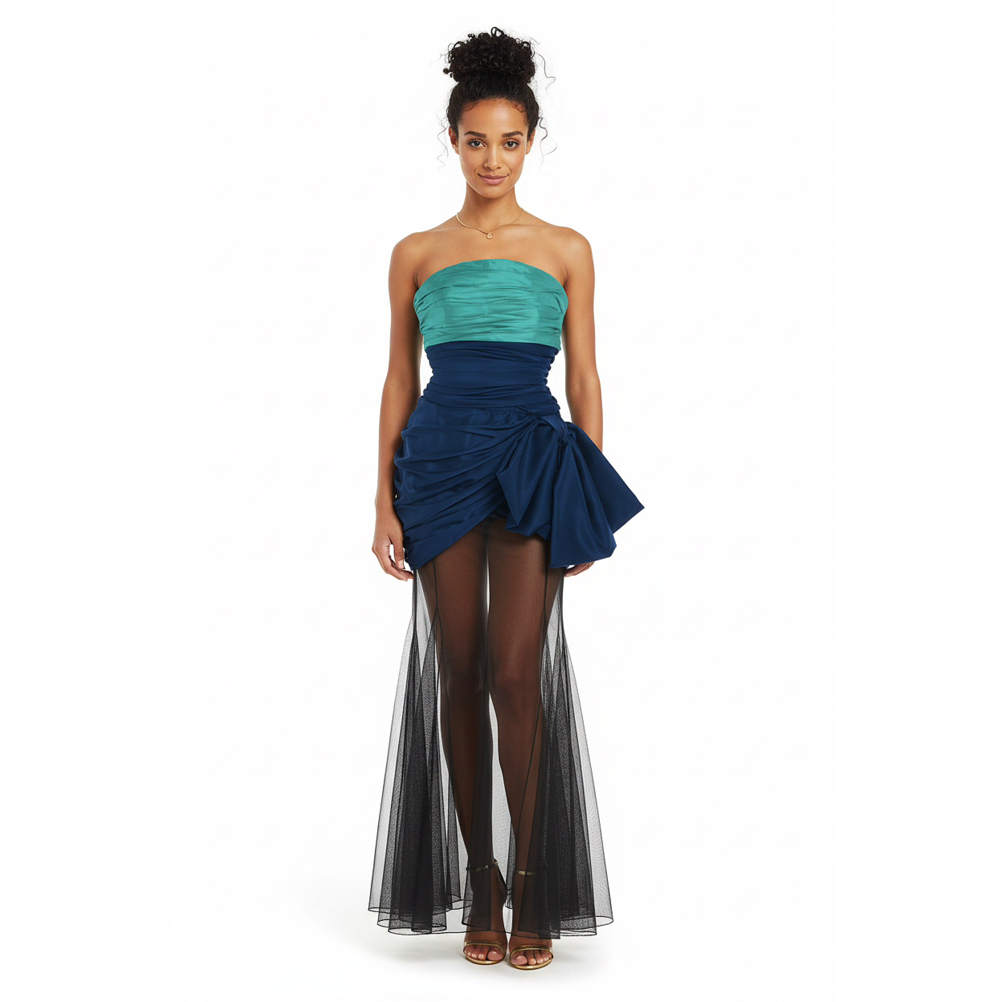 Woman wearing a two-tone strapless dress with teal top and navy skirt on a white background