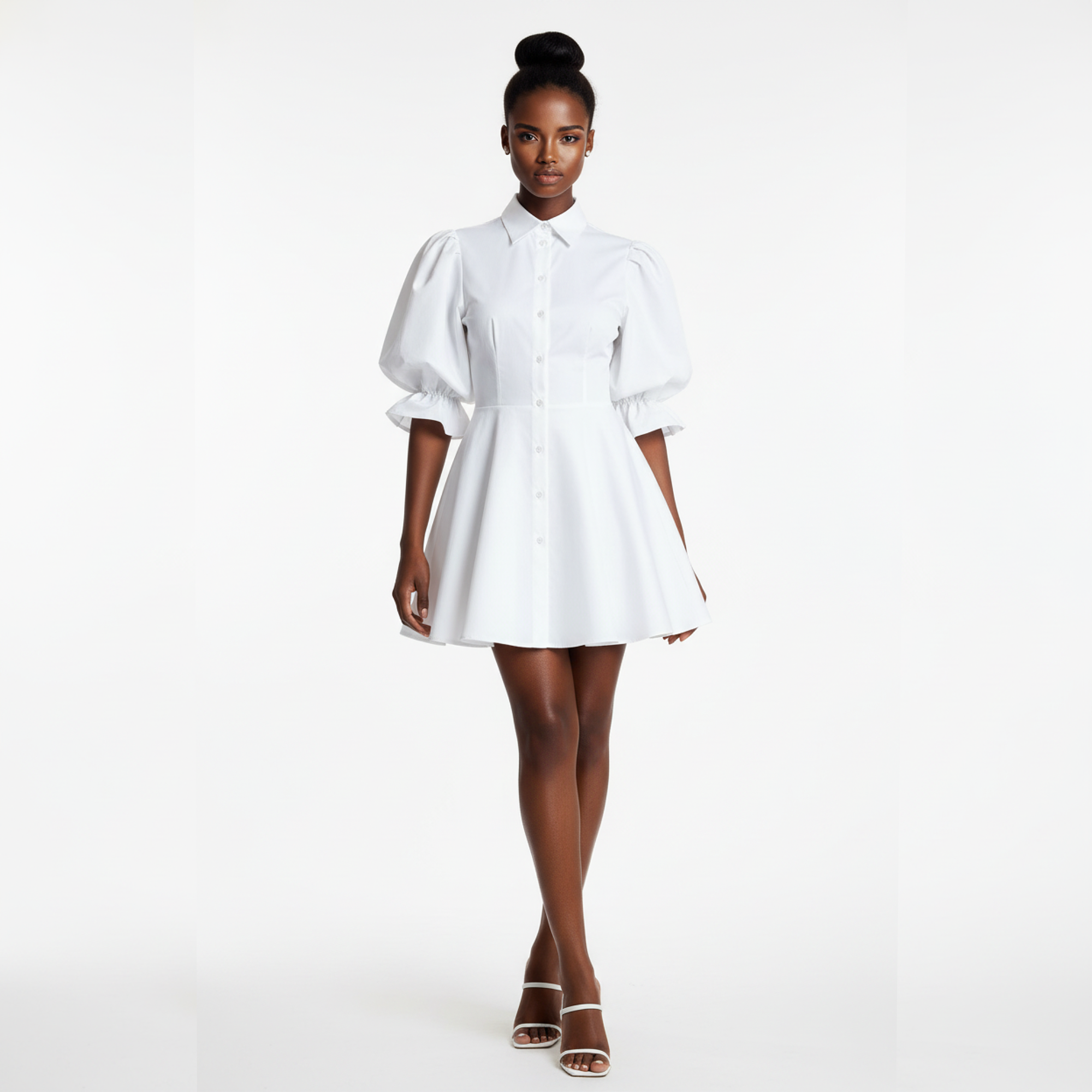 Woman wearing a white dress on a white background