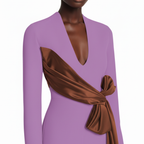 Purple dress with a brown sash on a white background