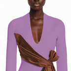 Purple dress with a brown sash worn by a model on a white background