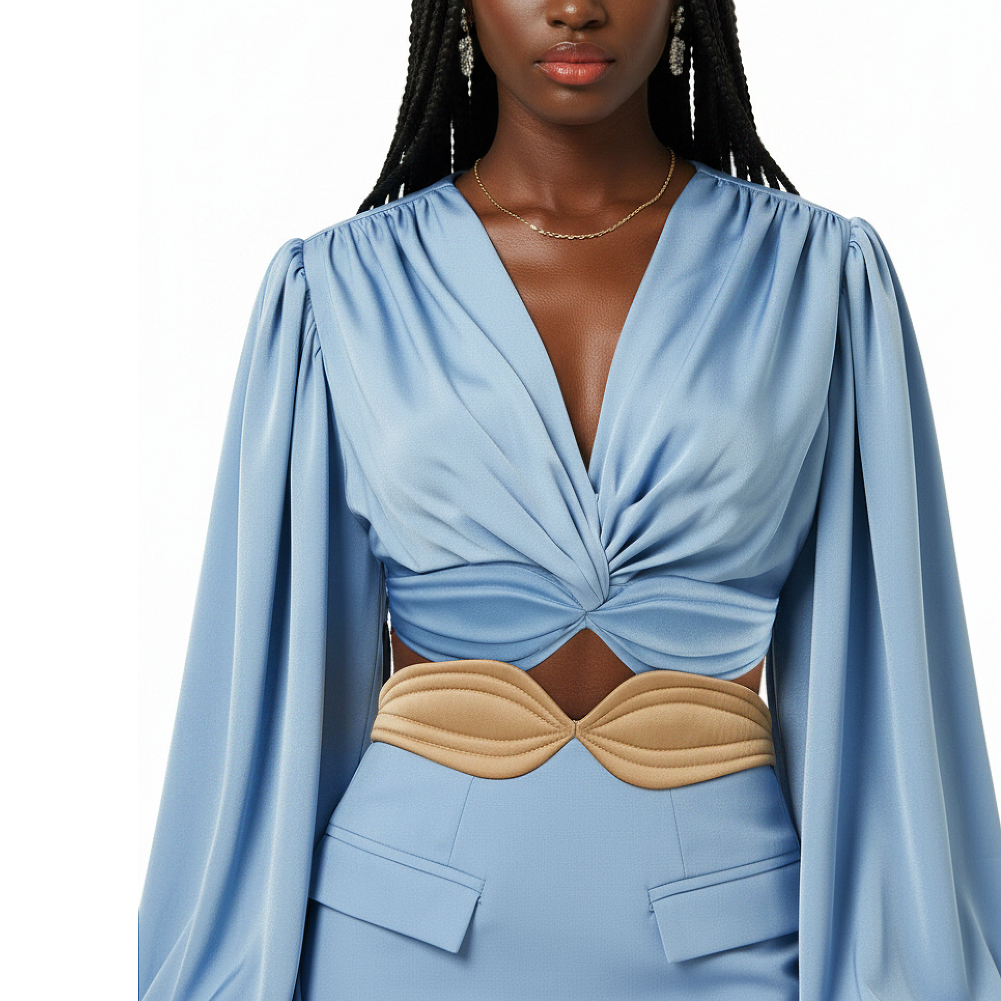 Woman wearing a blue dress with a beige belt on a white background