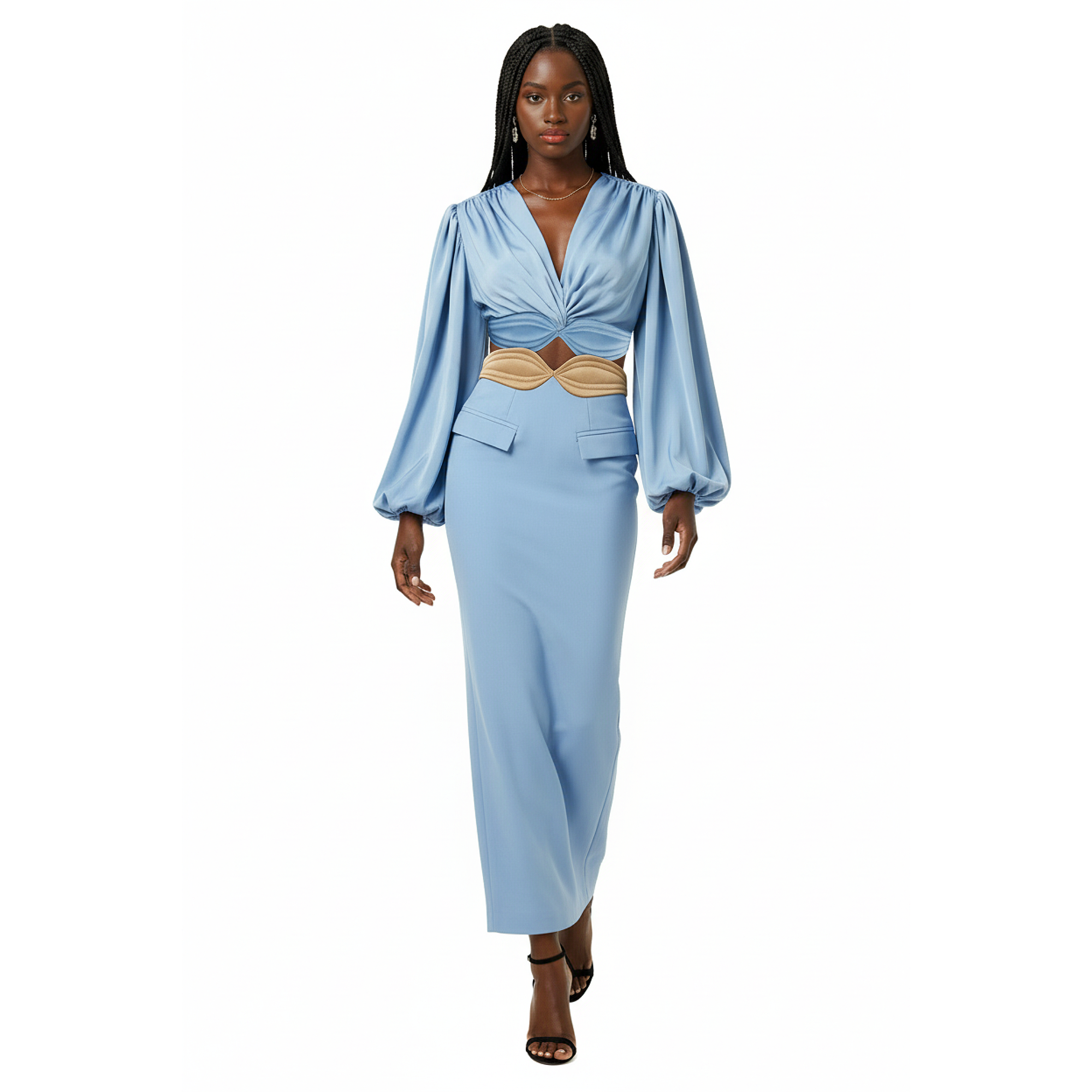 Woman wearing a light blue outfit with a belt on a white background