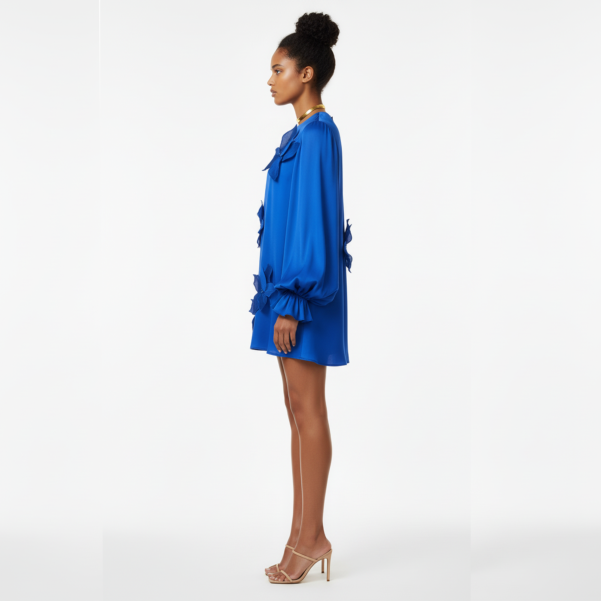 Woman wearing a blue dress on a white background