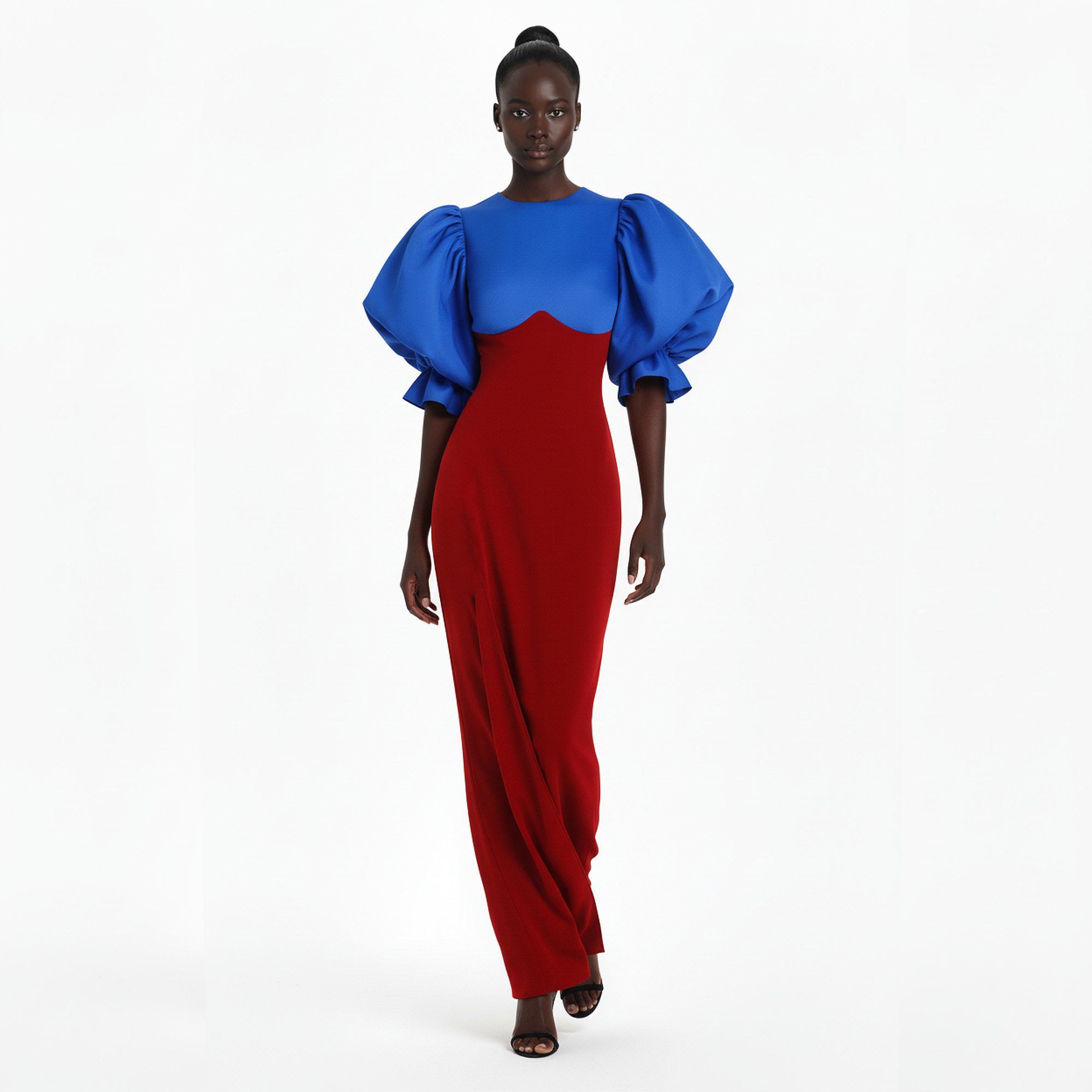 Woman wearing a blue and red dress on a white background