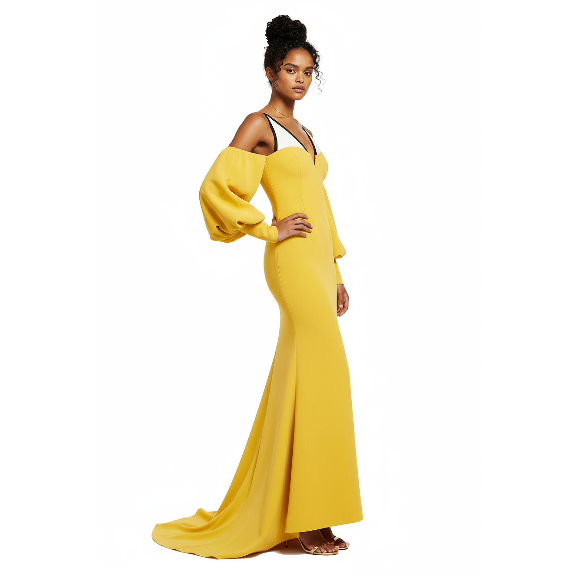 Woman wearing a yellow evening gown on a white background