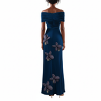 Navy blue off-shoulder gown with floral embellishments on a white background