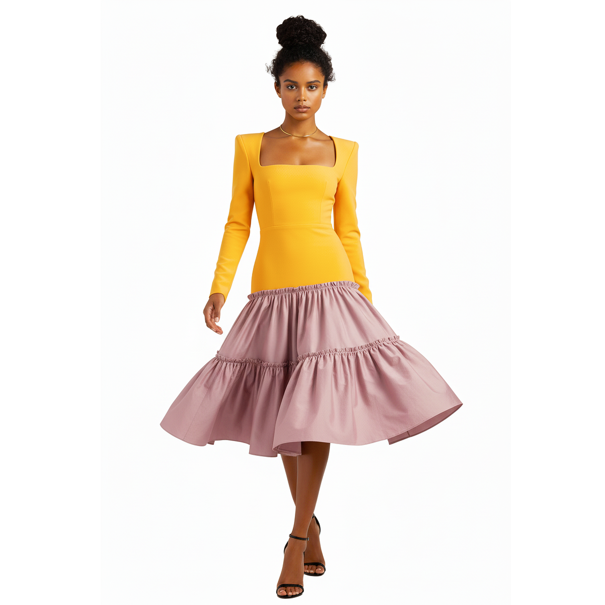 Woman wearing a yellow top and pink skirt on a white background